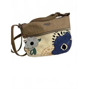 Relic Purse with Faux leather flowers.